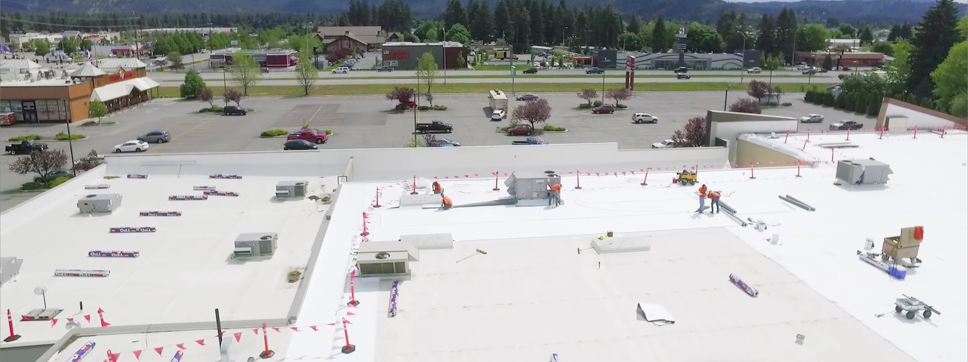 Strip Mall Grocery Store TPO Roof Recover In Progress - Coeur d'Alene, Idaho