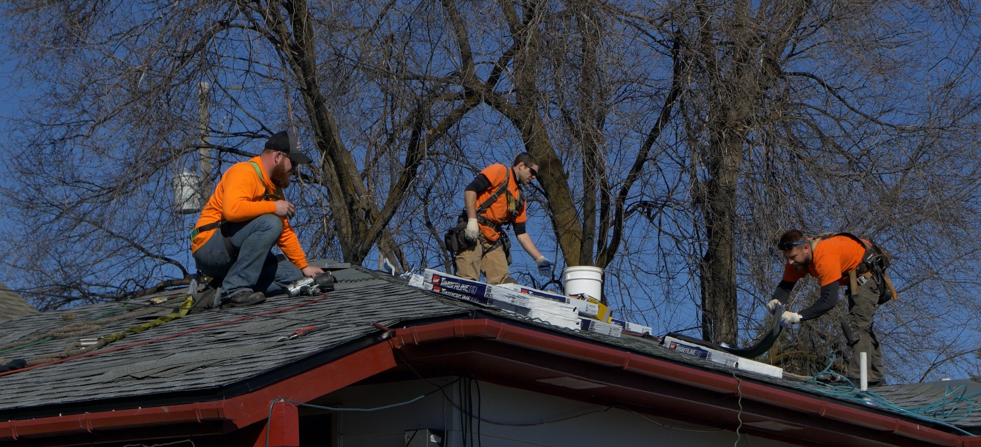 Spokane Roofing Company Construction Crew Installing A New Shingle Roof