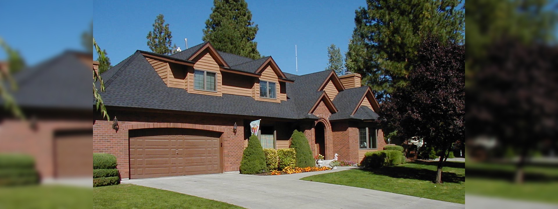 Modern, Brick Residence With Shingled Hip Roof And Dormers - Spokane, Washington