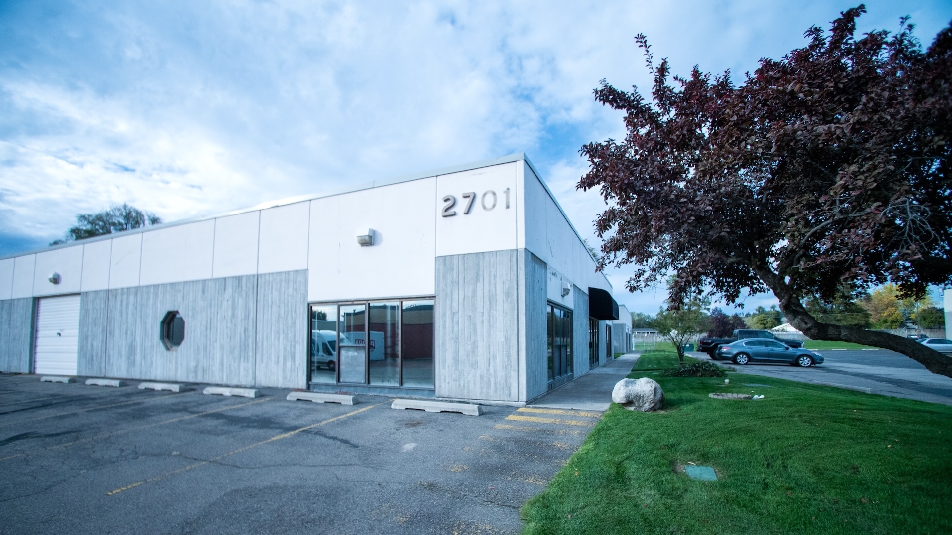 Two-Story Commercial Building Roof Warrants Professional Inspection And Maintenance